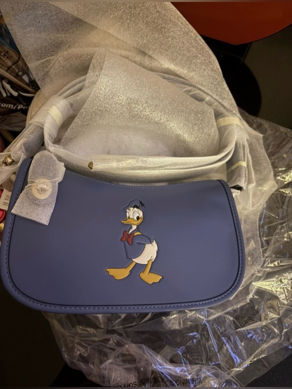 New! SOLDOUT DISNEY X COACH Swinger Bag Donald Duck